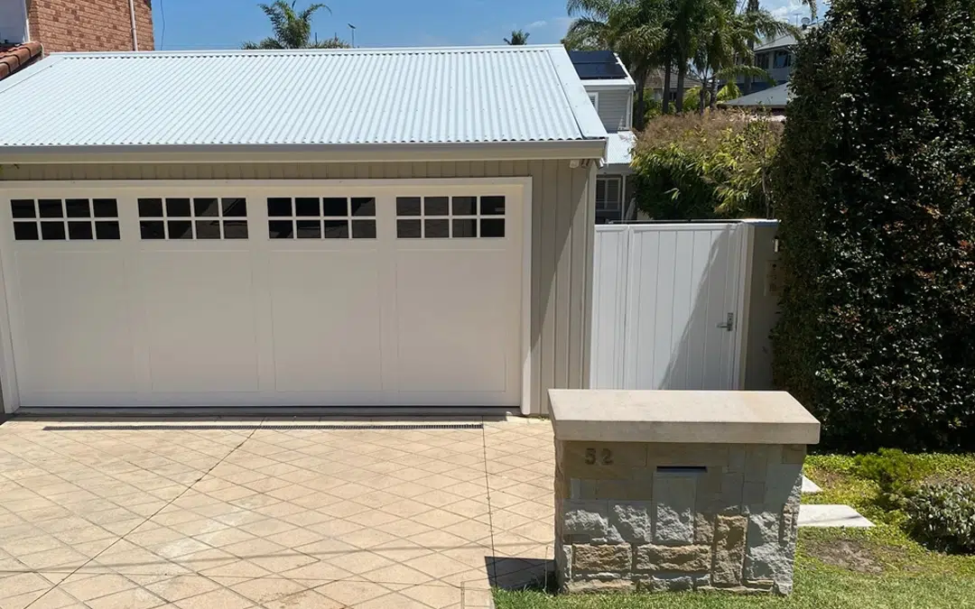 designer garage door Hamptons style with windows tricoya white